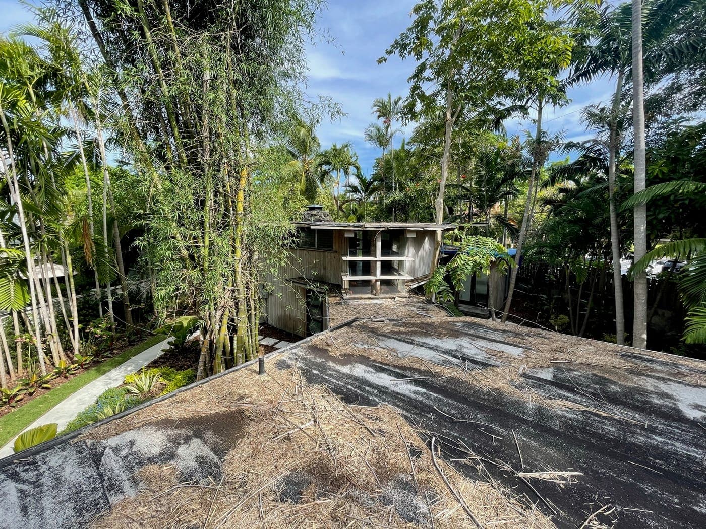 Alfred Browning Parker tropical modernist home. Roof work underway on the flat sections.
