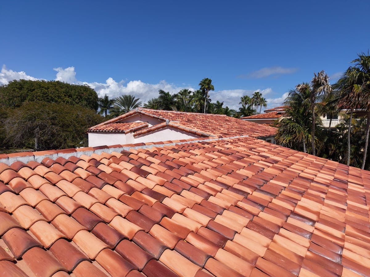 Aerial of a red barrel tile roof.