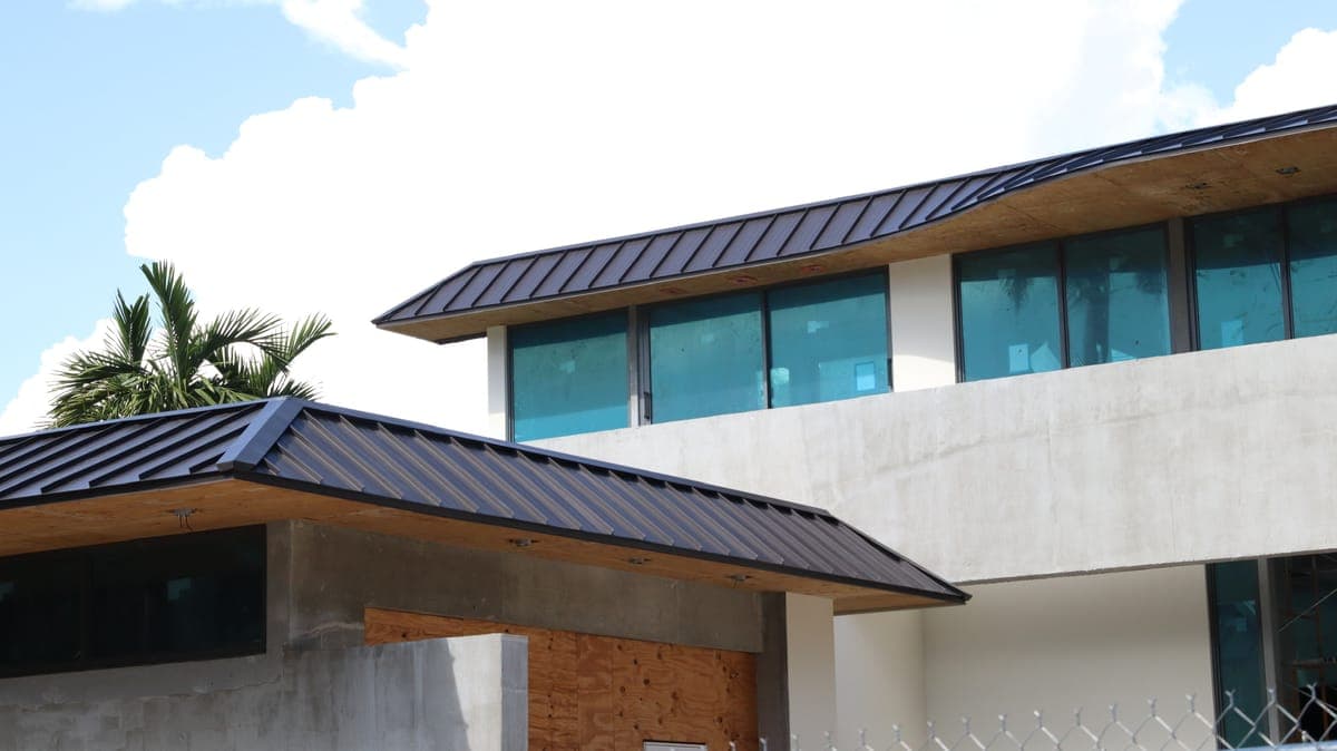 Contemporary home with a dark metal roof.