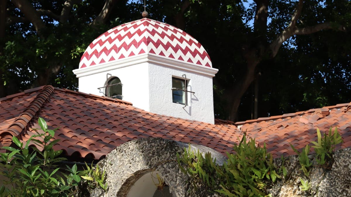 Tile roof with a decorative cupola.