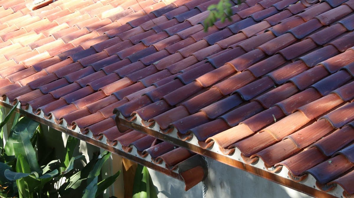 Multi-color barrel tile roof close-up.