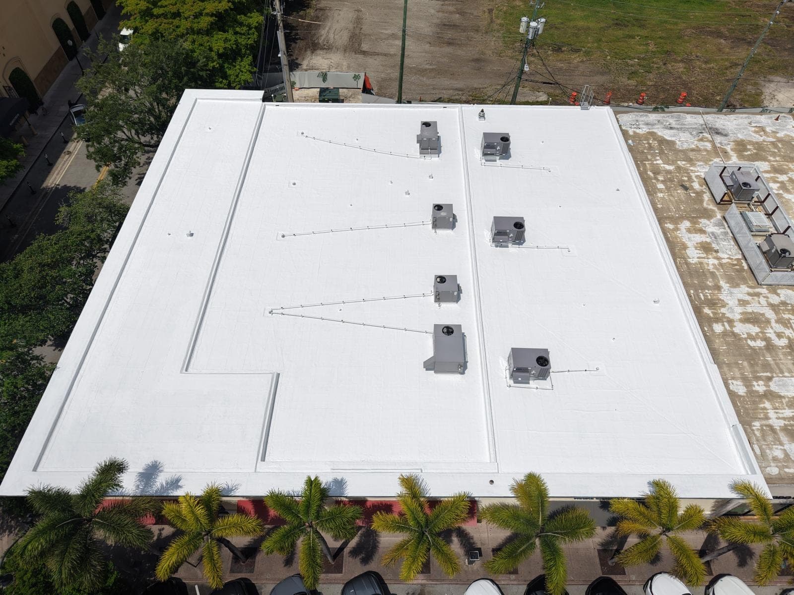 The same roof from the same angle, finished in white acrylic coating.