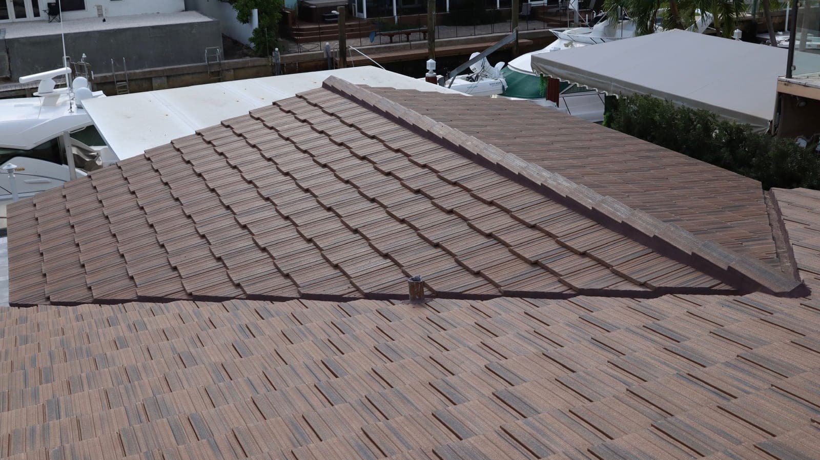 Flat Tile roof in South Florida by M. Romero's Roofing